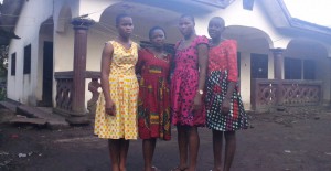 Theresia (second from left) with 'her' three girls in Cameroon.